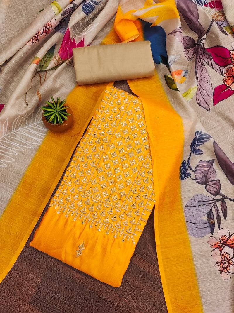 yellow cotton embroidered dress material