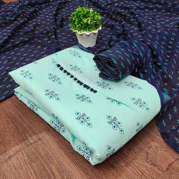 sea green cotton printed dress material 1