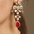 Gold plated kundan red stones necklace set