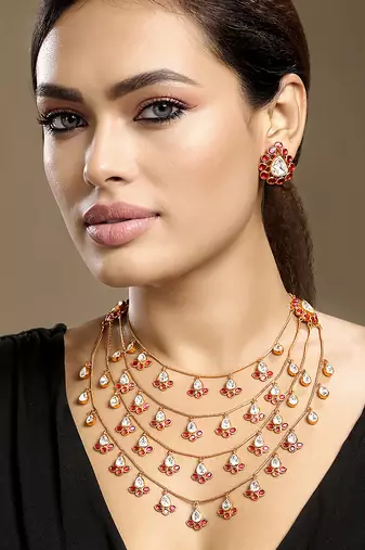 Gold plated kundan red stones necklace set