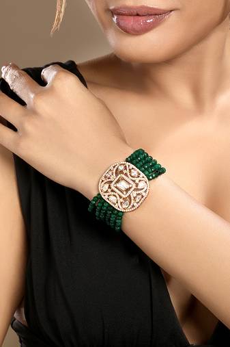 Gold plated kundan green stones bracelet