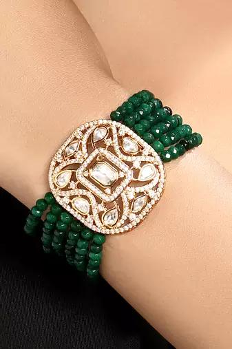 Gold plated kundan green stones bracelet