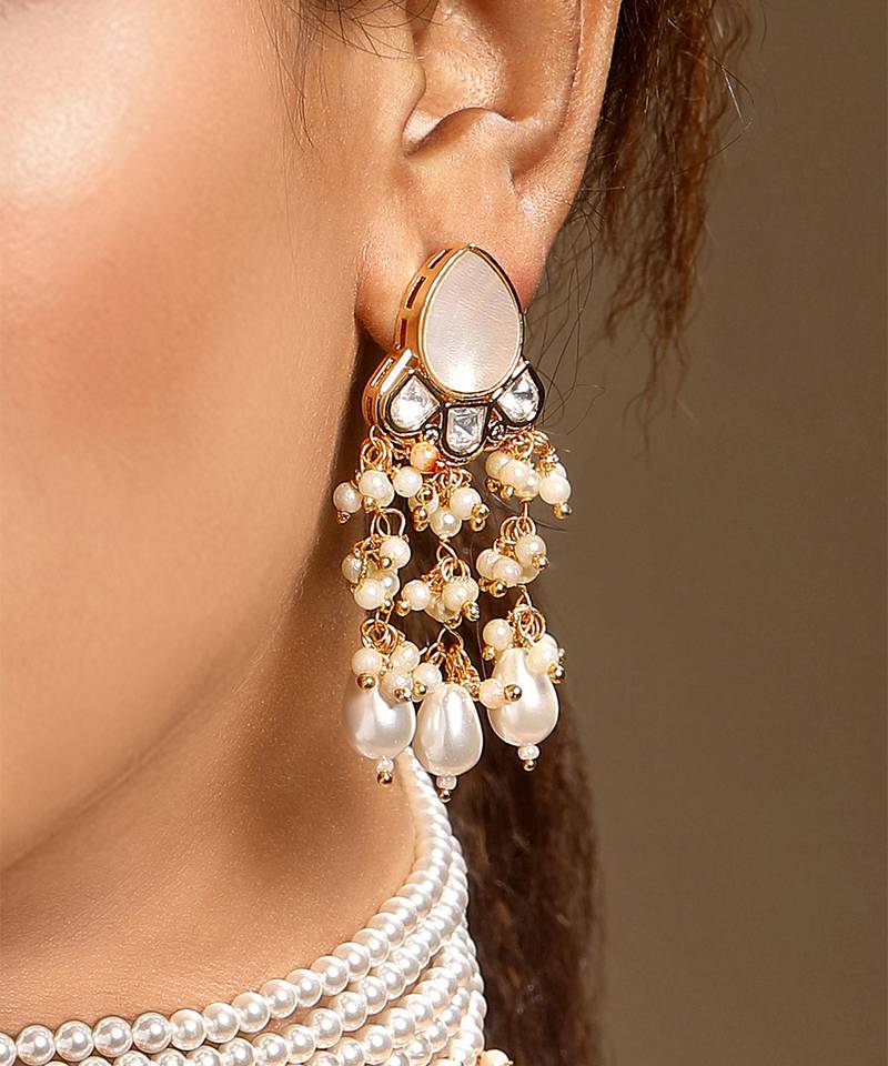 Gold plated kundan pink stones dangler earrings