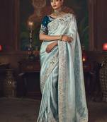 Sky blue zari woven silk blend embroidered saree for wedding wear
