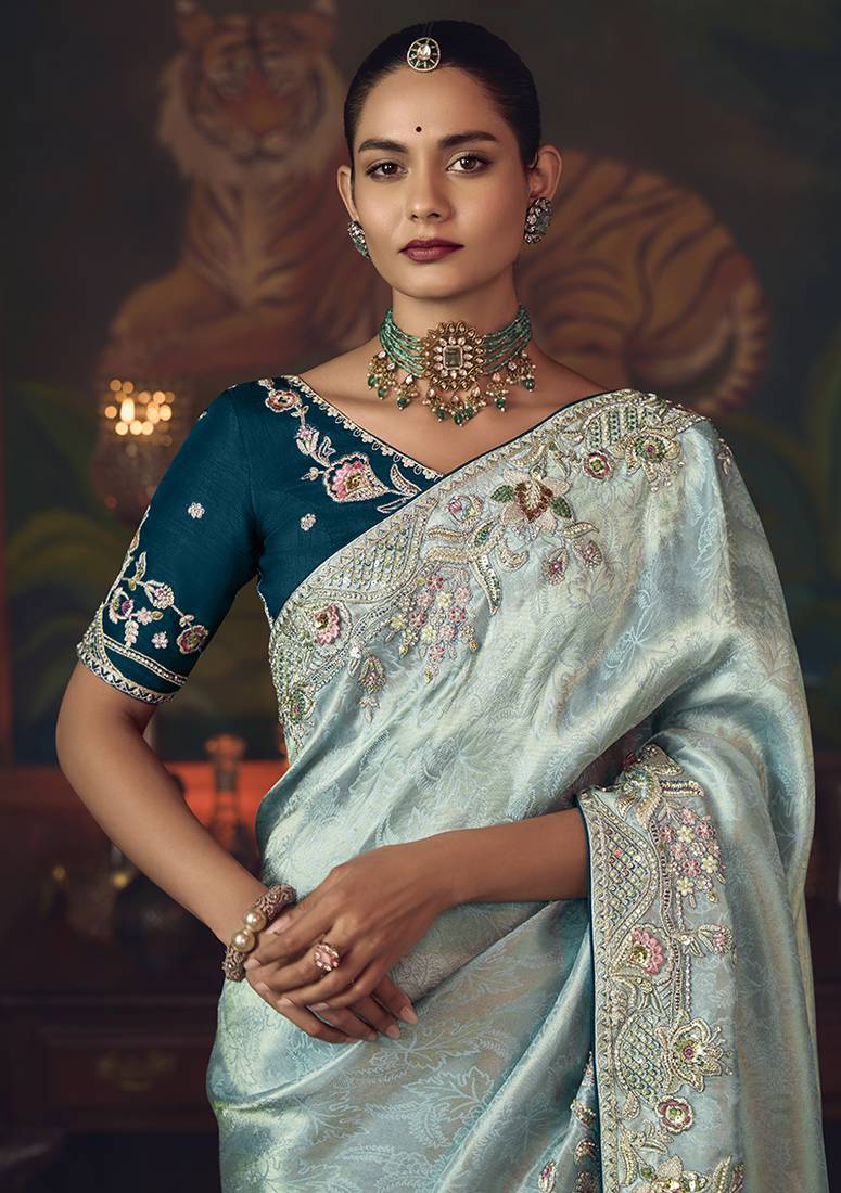 Sky blue zari woven silk blend embroidered saree for wedding wear