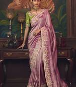 Onion pink zari woven silk blend embroidered saree for wedding wear