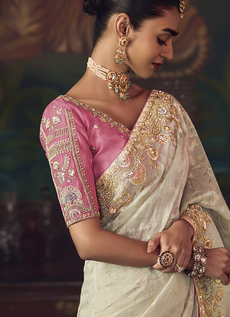 Off  white zari woven silk blend embroidered saree for wedding wear
