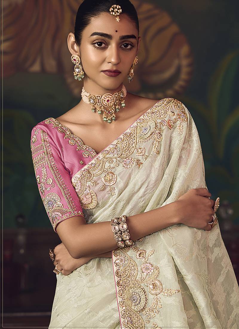 Off  white zari woven silk blend embroidered saree for wedding wear