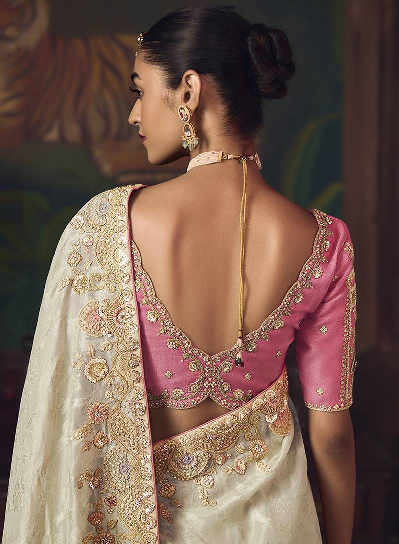 Off  white zari woven silk blend embroidered saree for wedding wear
