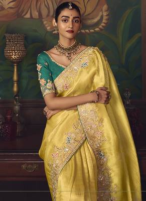 Yellow zari woven silk blend embroidered border saree 3