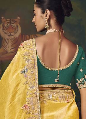 Yellow zari woven silk blend embroidered border saree 4