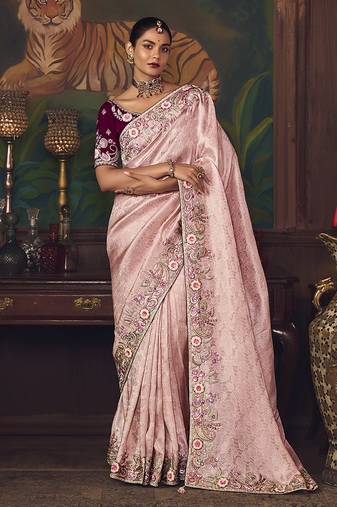 Light pink zari woven silk blend embroidered saree for wedding wear