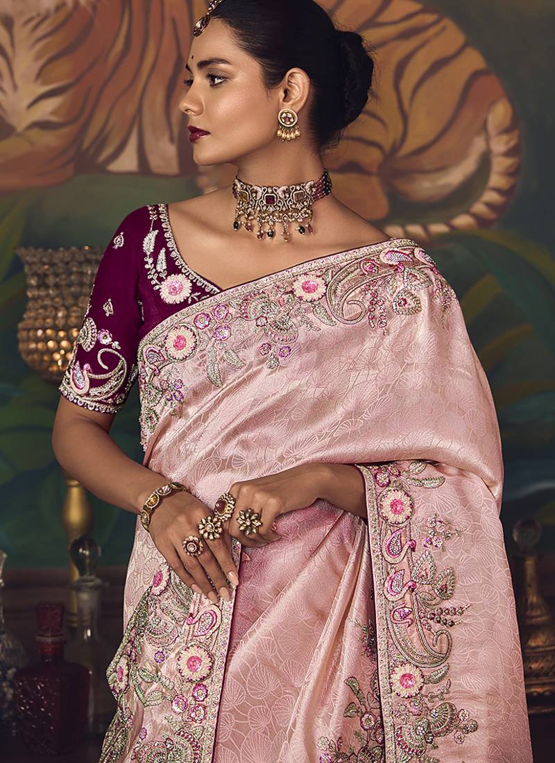 Light pink zari woven silk blend embroidered saree for wedding wear