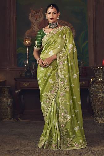 Parrot green zari woven silk blend embroidered saree for wedding wear