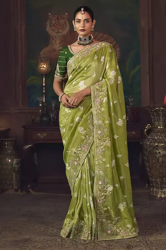 Parrot green zari woven silk blend embroidered saree for wedding wear