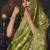 Parrot green zari woven silk blend embroidered saree for wedding wear