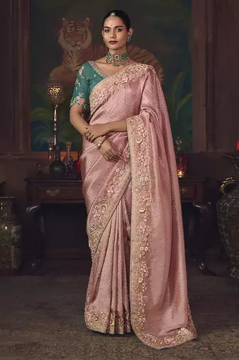 Pink zari woven silk blend embroidered saree for wedding wear