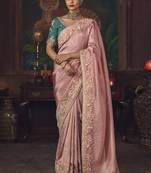 Pink zari woven silk blend embroidered saree for wedding wear