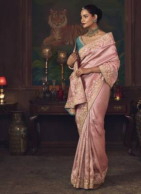 Pink zari woven silk blend embroidered border saree 2