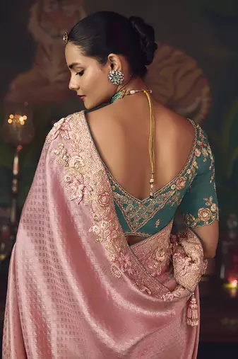 Pink zari woven silk blend embroidered border saree