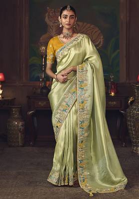 Light green zari woven silk blend embroidered border saree 1