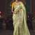 Light green zari woven silk blend embroidered saree for wedding wear