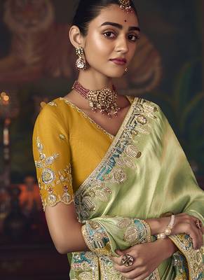 Light green zari woven silk blend embroidered border saree 3