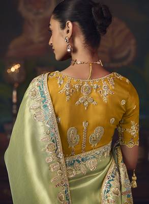 Light green zari woven silk blend embroidered border saree 4