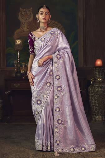 Lavender zari woven silk blend embroidered saree for wedding wear