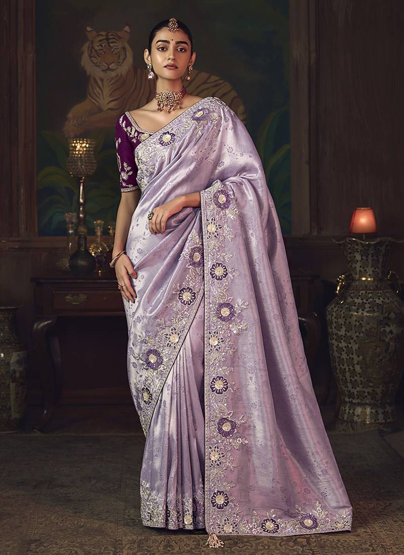 Lavender zari woven silk blend embroidered saree for wedding wear