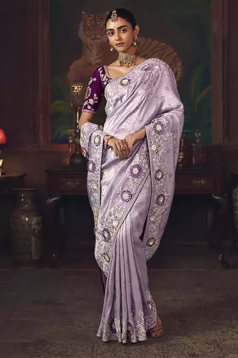 Lavender zari woven silk blend embroidered border saree