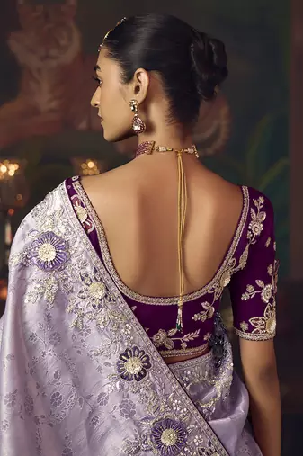 Lavender zari woven silk blend embroidered border saree