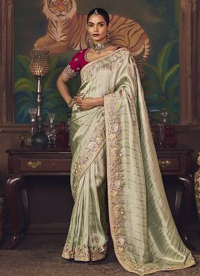Sea green zari woven silk blend embroidered border saree 1