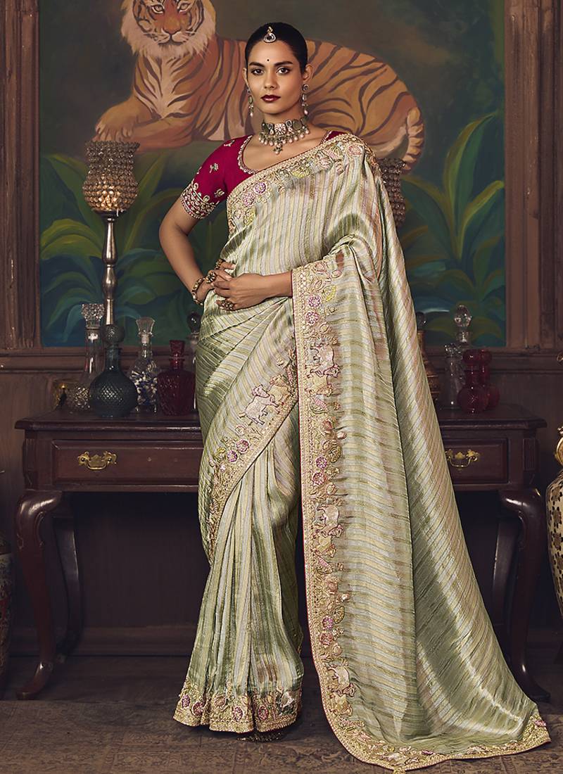 Sea green zari woven silk blend embroidered saree for wedding wear