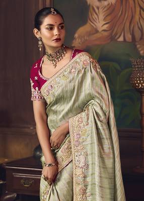 Sea green zari woven silk blend embroidered border saree 2