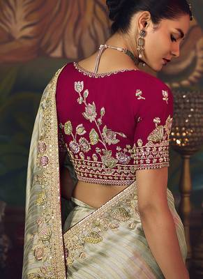 Sea green zari woven silk blend embroidered border saree 3