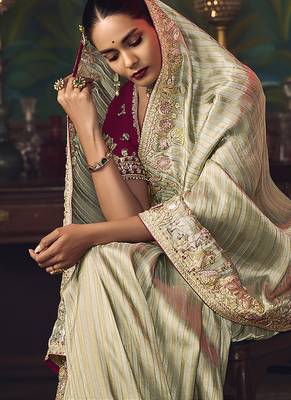 Sea green zari woven silk blend embroidered border saree 4