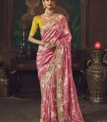 Coral pink zari woven silk blend embroidered saree for wedding wear