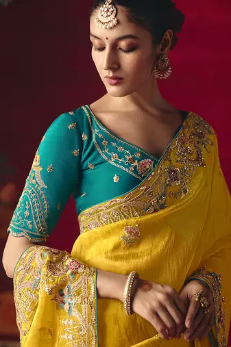 Yellow fancy fabric embroidered work saree