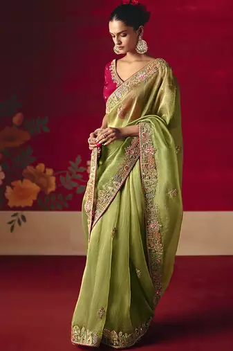 Green fancy fabric embroidered work saree