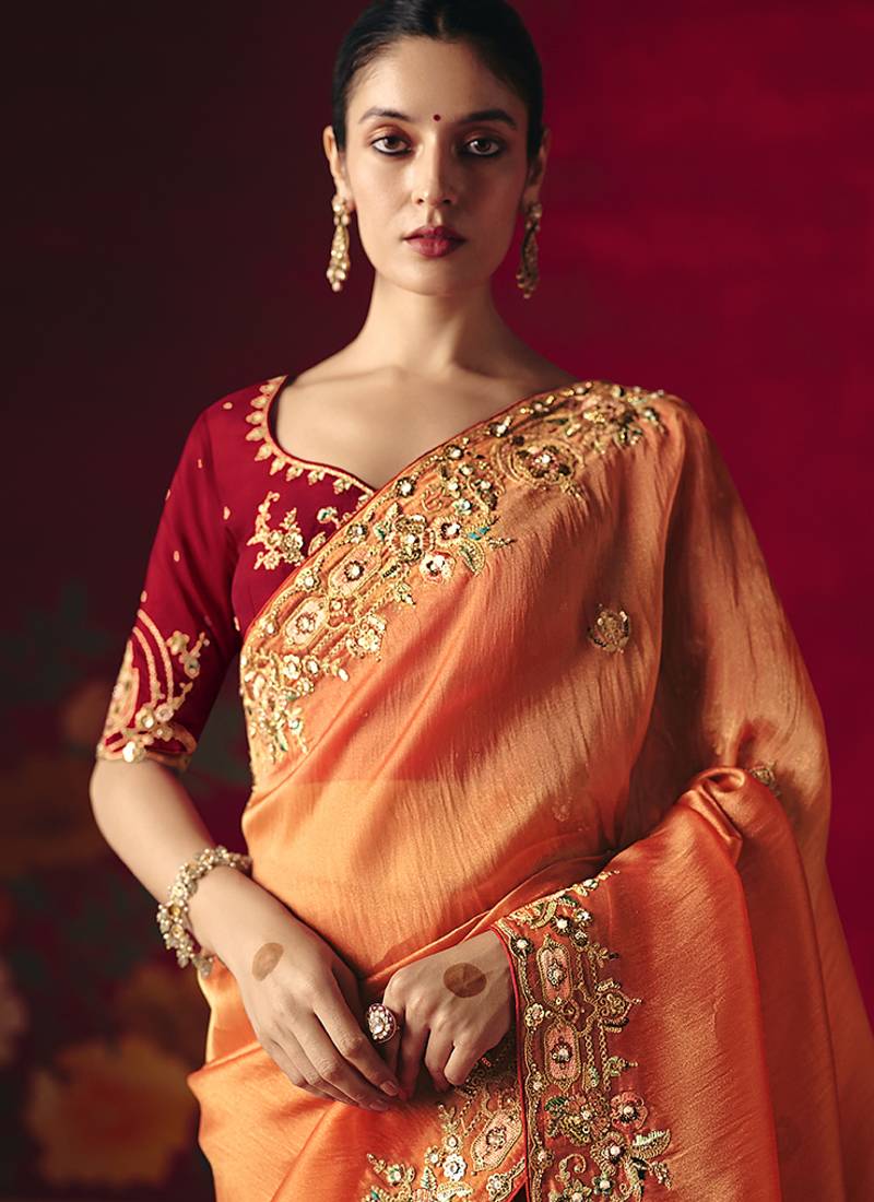 Orange fancy fabric embroidered thread work classic saree