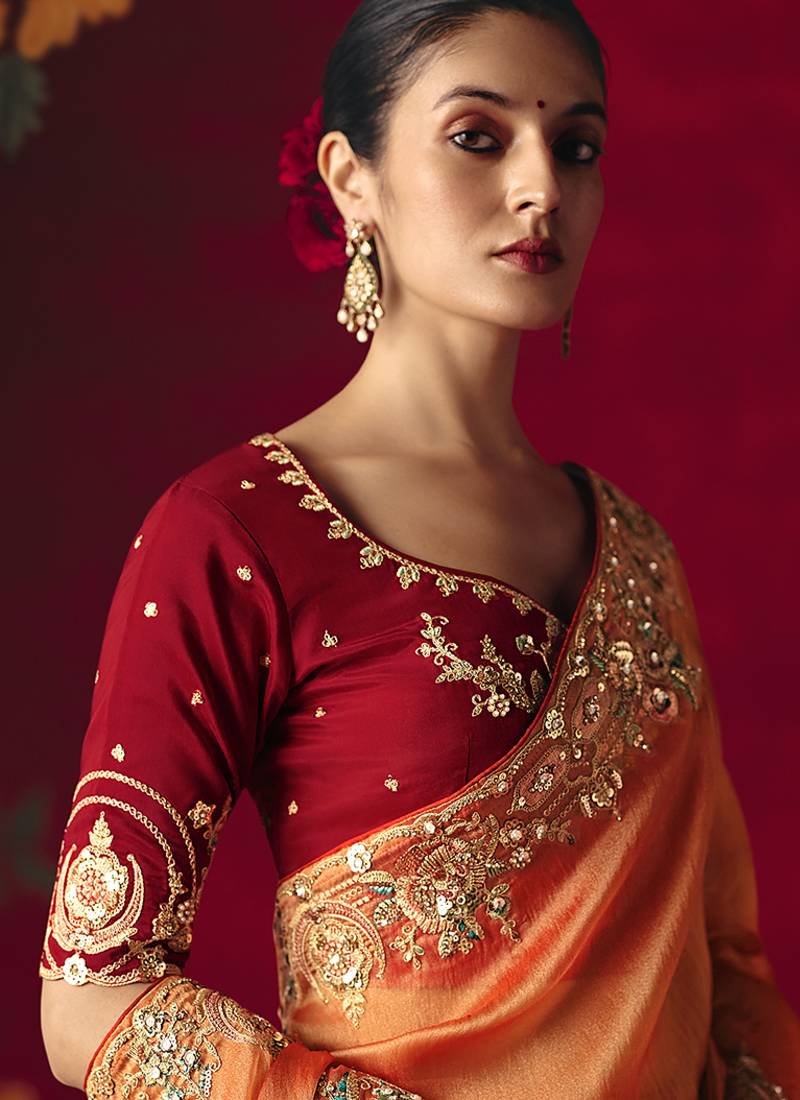 Orange fancy fabric embroidered thread work classic saree