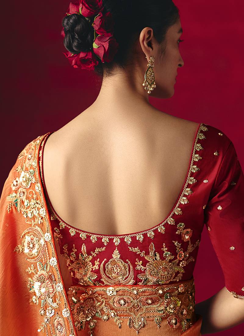 Orange fancy fabric embroidered thread work classic saree