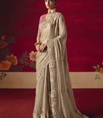 Beige fancy fabric embroidered thread work classic saree