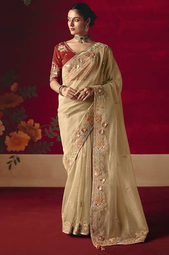 Beige fancy fabric embroidered thread work classic saree