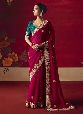 Rani pink fancy fabric embroidered work saree 1