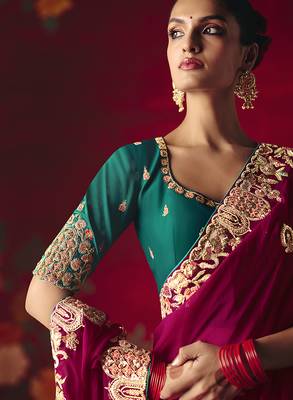 Rani pink fancy fabric embroidered work saree 3