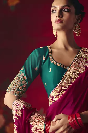 Rani pink fancy fabric embroidered work saree