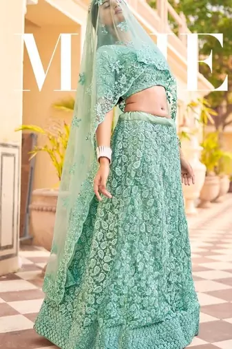 Turquoise net wedding wear lehenga choli set with embroidery & sequin work