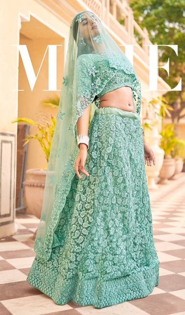 Turquoise net wedding wear lehenga choli set with embroidery & sequin work